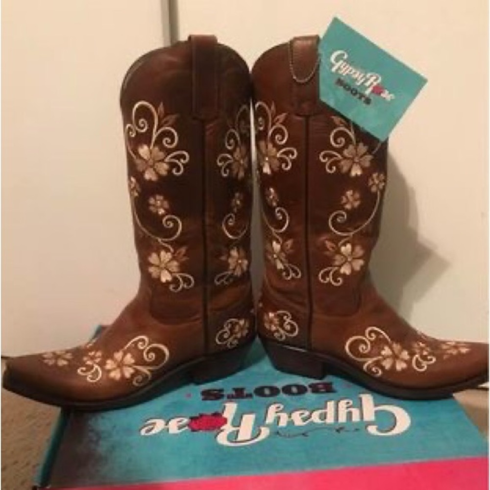 Ladies cowboy boots. New with tags.  Never worn.  Size 9.  Beautiful embroidery.